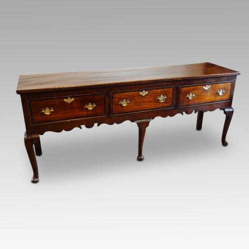 George III oak cross banded dresser base, 1