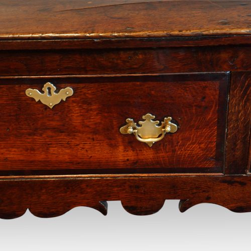 George III oak cross banded dresser base shaped apron