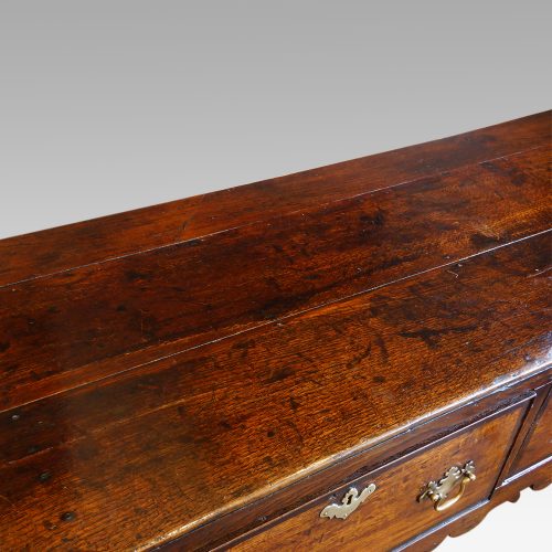 George III oak cross banded dresser base top detail