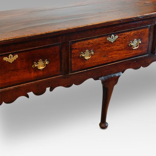 George III oak cross banded dresser base,central leg