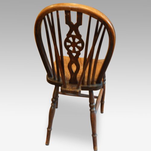 Set of 8 antique Windsor chairs rear view