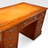 Victorian oak double pedestal desk top detail