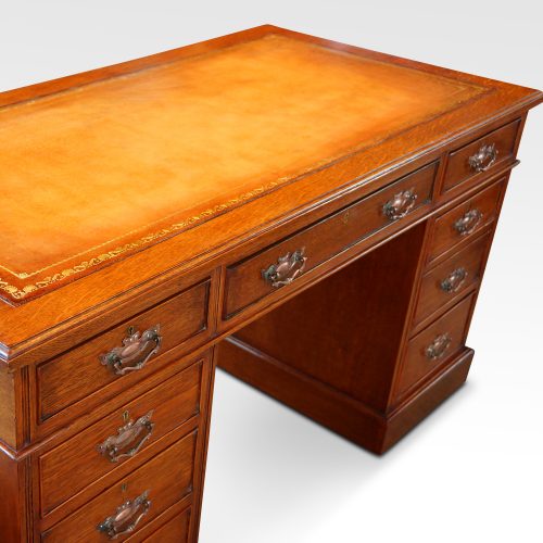 Victorian oak double pedestal desk top detail