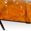 Antique mahogany twin pillar dining table leaf detail