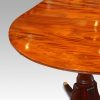 Antique mahogany twin pillar dining table end view