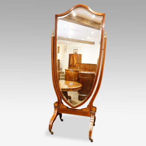 Edwardian inlaid mahogany shield shape cheval mirror at angle