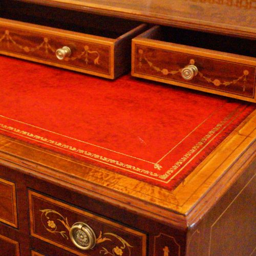 Edwardian inlaid writing table small drawers