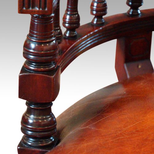 Edwardian mahogany horse shoe shaped desk chair turning