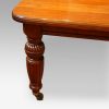 Edwardian walnut extending dining table end leg