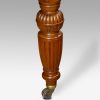 Edwardian walnut extending dining table leg detail