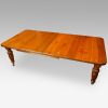 Edwardian walnut extending dining table top view