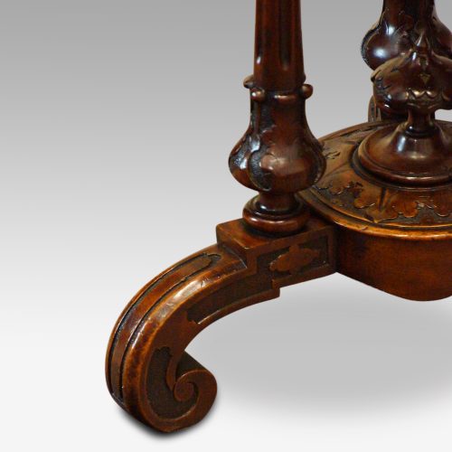Victorian inlaid walnut circular workbox front leg