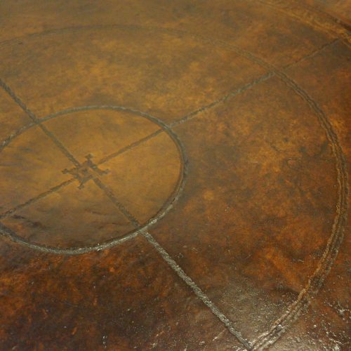 Edwardian mahogany drum table leather detail