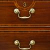 George III mahogany linen press swan neck handles