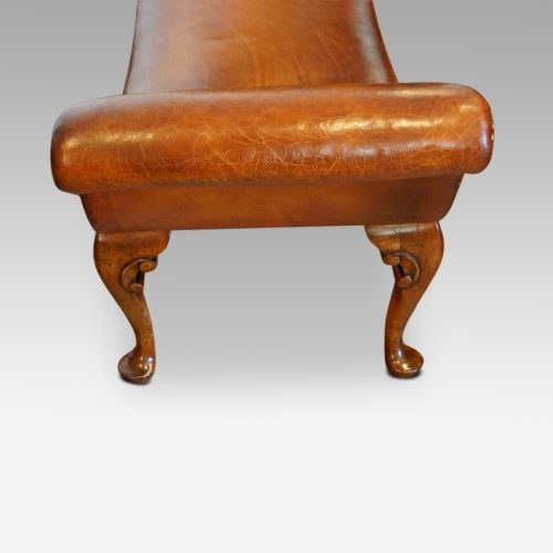 Queen Anne style walnut and leather window seat end view