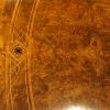 Victorian oval inlaid walnut coffee table top detail
