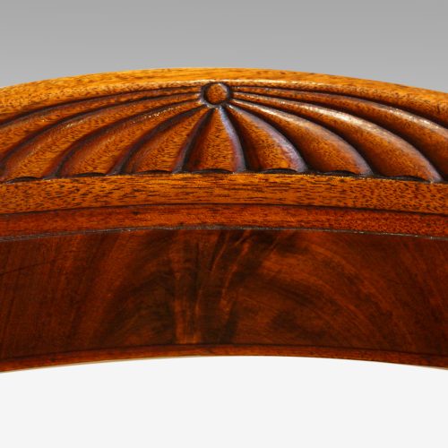 William IV mahogany scroll arm desk chair crest