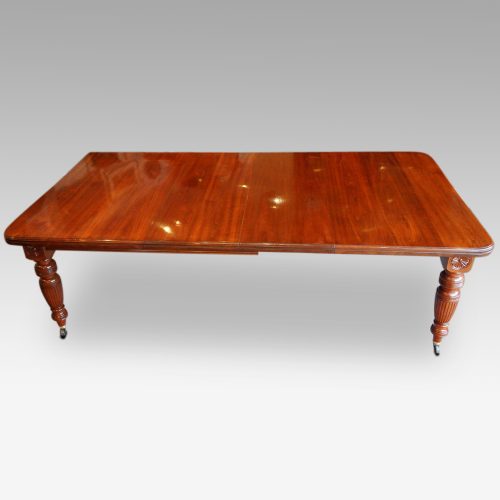 Edwardian walnut extending dining table, by Hampton & sons