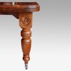 Edwardian walnut extending dining table, by Hampton & sons leg detail