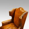 Pair of oak and leather wing chairs wing