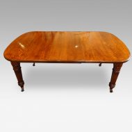 Victorian oak extending dining table with one leaf