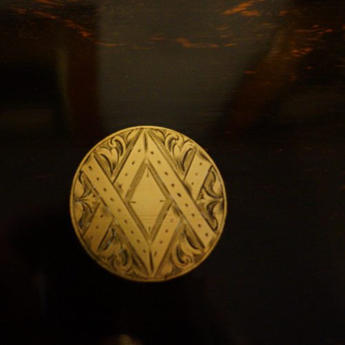 Antique coromandel writing slope inset motif