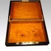 Antique coromandel writing slope lid interior