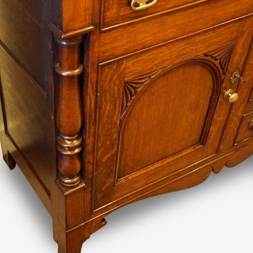 Antique oak Anglesey dresser base column detail