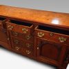 Antique oak Anglesey dresser base drawers open