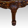 Edwardian walnut love seat front leg