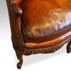 Edwardian walnut love seat leg and arm