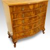 Maple & co walnut serpentine chest of drawers angle view