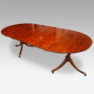 Regency style mahogany twin pillar dining table