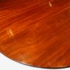 Regency style mahogany twin pillar dining table rounded end