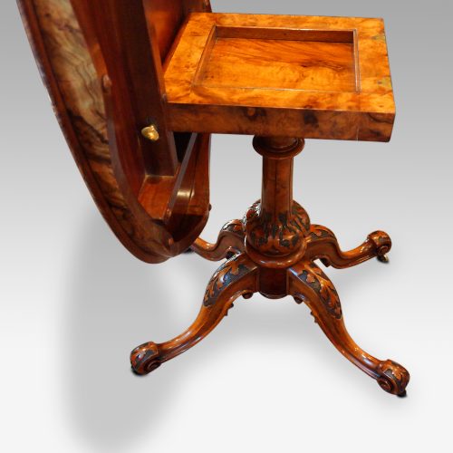 Victorian inlaid walnut oval centre table side view base