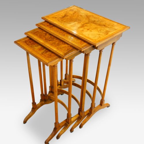 Walnut cross banded nest of 4 tables