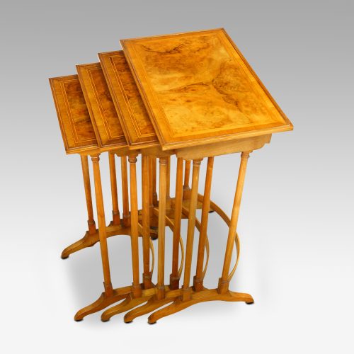 Walnut cross banded nest of 4 tables side view