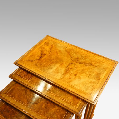 Walnut cross banded nest of 4 tables top