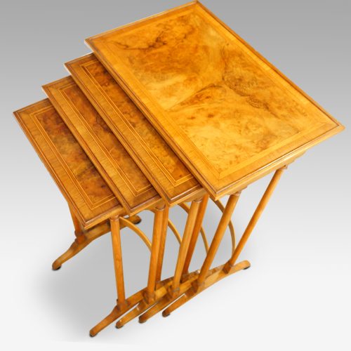 Walnut cross banded nest of 4 tables view from top