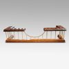 Edwardian oak and brass club fender