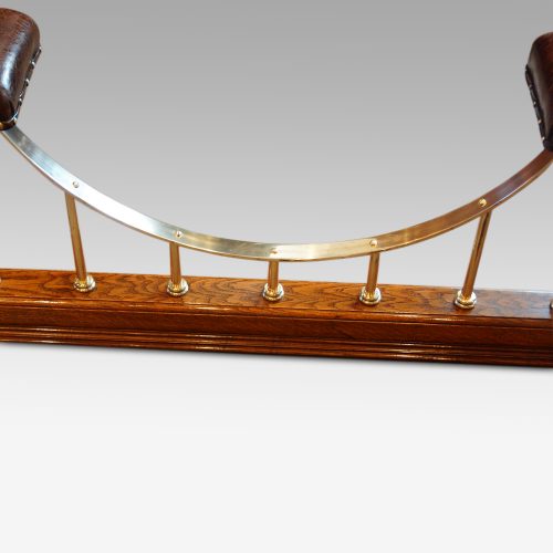 Edwardian oak and brass club fender centre