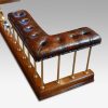 Edwardian oak and brass club fender end