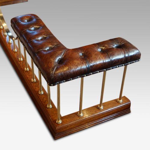 Edwardian oak and brass club fender end