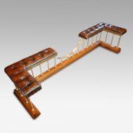 Edwardian oak and brass club fender rear