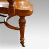 Edwardian oak desk chair by Bros. leg detail