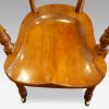 Edwardian oak desk chair by Bros. long seat