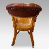 Edwardian oak desk chair by Bros. rear