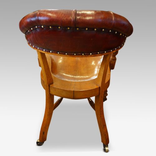 Edwardian oak desk chair by Bros. rear