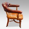 Edwardian oak desk chair by Bros. side view