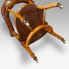 Edwardian oak desk chair by Bros. underneath